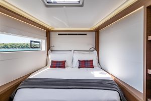 Cabin berth with window of Lagoon 46 catamaran