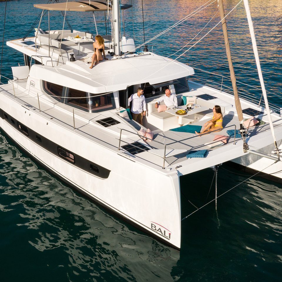 Small group of friends enjoying the forward deck of the Bali 4.6 catamaran