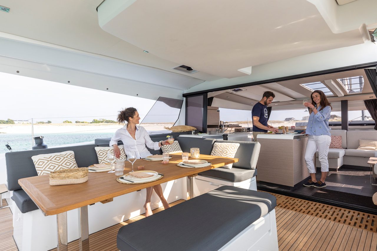 People enjoying living areas on the Fountaine Pajot Aura 51 sailing yacht