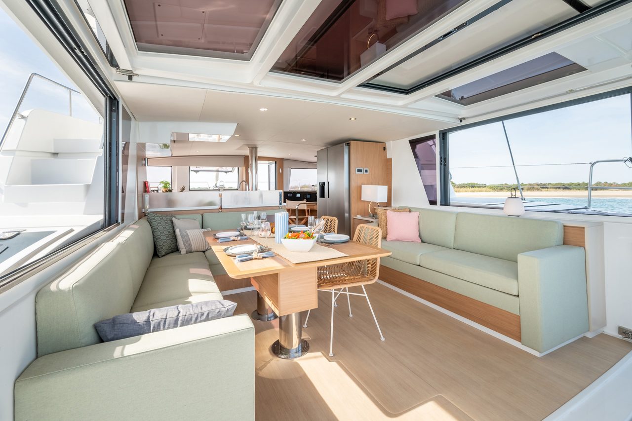 Bali 4.6 catamaran light wood saloon with dining table set