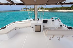 View of clear blue waters from the flybridge of the Bali 5.4