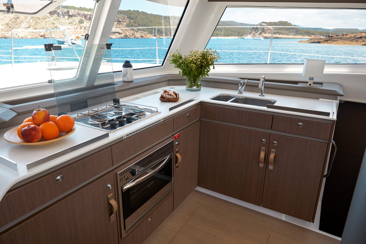 Interior view of the kitchen aboard the Bali Catspace boat