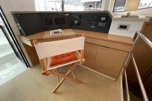 Chart table and chair in the forward salon area of the Bali 4.4