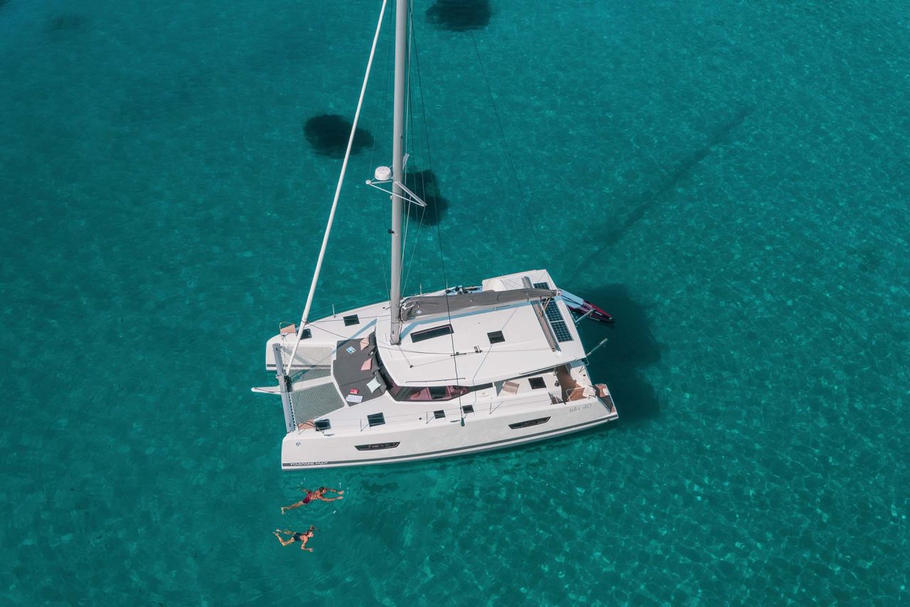 Aerial view of an anchored Fountaine Pajot Isla 40 catamaran