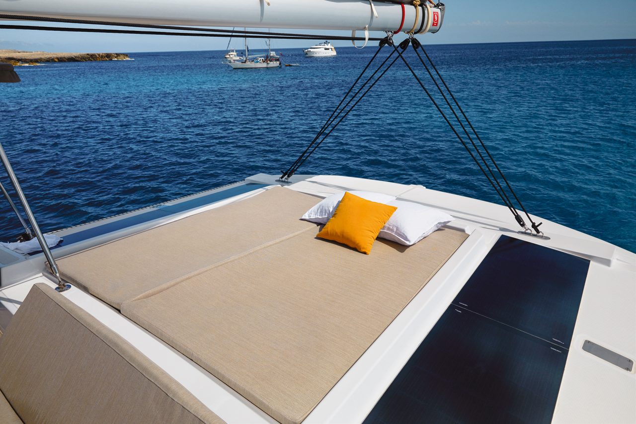 Cushioned sunbed lounge on the flybridge of the Bali 4.2